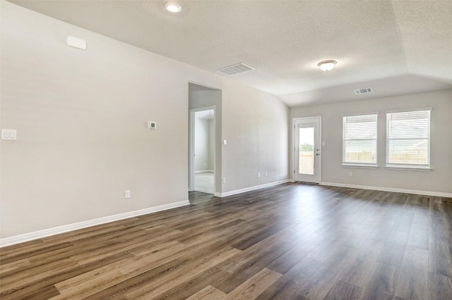152 Greenway Ln, Georgetown, TX 78628 - empty room with dark wood-type flooring and a textured ceiling