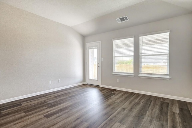 152 Greenway Ln, Georgetown, TX 78628 - unfurnished room with dark wood-style floors and lofted ceiling