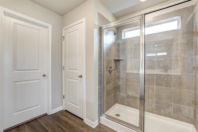 152 Greenway Ln, Georgetown, TX 78628 - full bathroom with a stall shower and wood finished floors