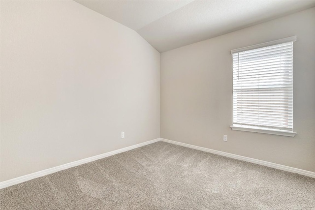 152 Greenway Ln, Georgetown, TX 78628 - carpeted empty room featuring baseboards and lofted ceiling