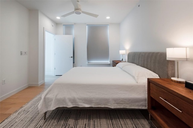 1600 S 1st St Unit 219, Austin, TX 78704 - bedroom featuring light wood finished floors, recessed lighting, baseboards, and ceiling fan
