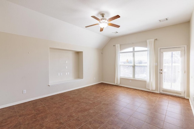 2532 Santa Barbara Loop, Round Rock, TX 78665 - unfurnished room with ceiling fan, lofted ceiling, baseboards, and dark tile patterned flooring