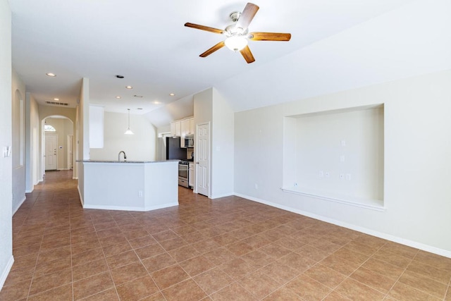 2532 Santa Barbara Loop, Round Rock, TX 78665 - unfurnished living room with arched walkways, a ceiling fan, lofted ceiling, and recessed lighting