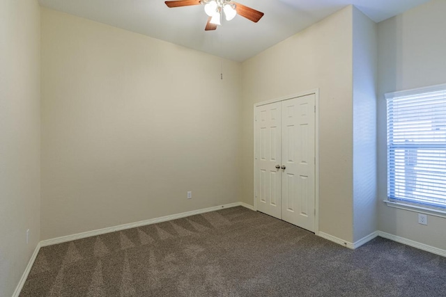 2532 Santa Barbara Loop, Round Rock, TX 78665 - unfurnished bedroom featuring dark colored carpet, a closet, and ceiling fan