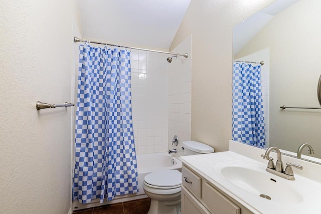 2532 Santa Barbara Loop, Round Rock, TX 78665 - bathroom featuring toilet, vanity, shower / bath combo, a textured wall, and lofted ceiling