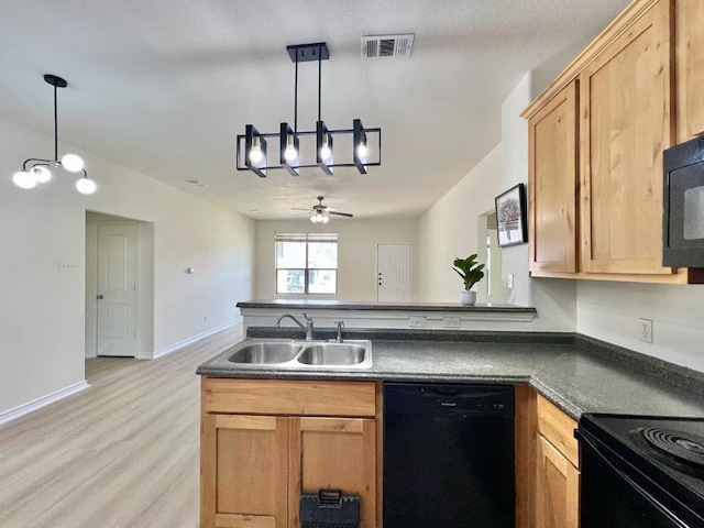 112 Flat Creek Dr, Robinson, TX 76706 - kitchen featuring black appliances, a sink, a peninsula, and a chandelier