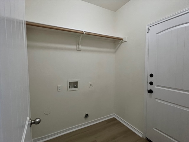 112 Flat Creek Dr, Robinson, TX 76706 - laundry area with hookup for an electric dryer, dark wood-style floors, hookup for a washing machine, hookup for a gas dryer, and baseboards