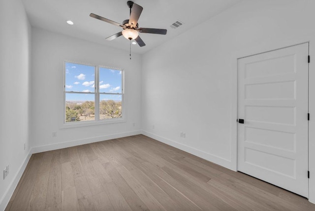 102 Mountain Home Rd, Horseshoe Bay, TX 78657 - spare room featuring light wood-style flooring, ceiling fan, baseboards, and recessed lighting