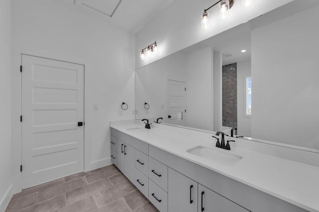 102 Mountain Home Rd, Horseshoe Bay, TX 78657 - bathroom with double vanity and baseboards