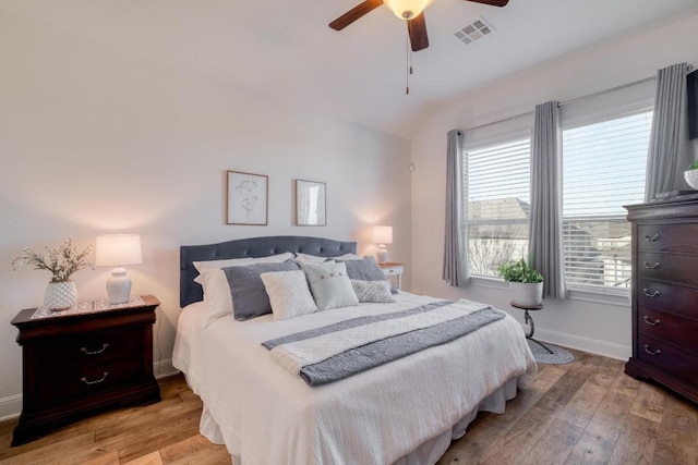 3204 Venezia Vw, Leander, TX 78641 - bedroom featuring light wood-style flooring, vaulted ceiling, and ceiling fan