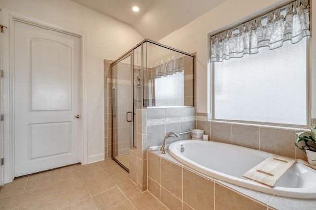 3204 Venezia Vw, Leander, TX 78641 - bathroom featuring a shower stall, a garden tub, tile patterned flooring, and recessed lighting
