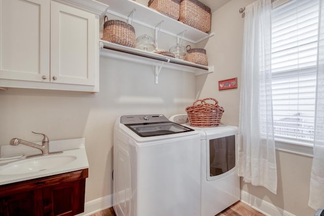 3204 Venezia Vw, Leander, TX 78641 - laundry room featuring independent washer and dryer and cabinet space