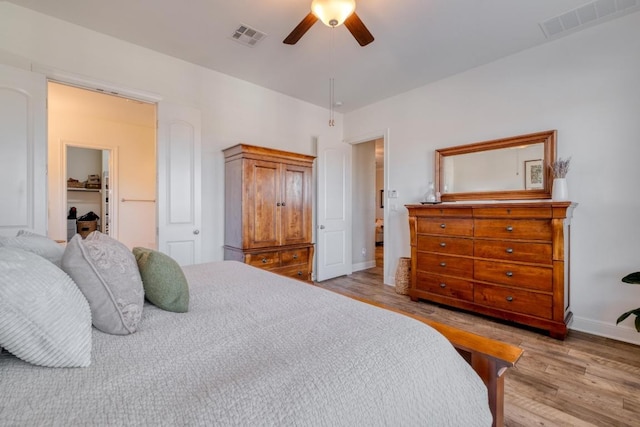 3204 Venezia Vw, Leander, TX 78641 - bedroom featuring light wood-type flooring and ceiling fan