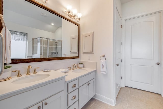 3204 Venezia Vw, Leander, TX 78641 - bathroom featuring double vanity, a shower with door, and tile patterned floors
