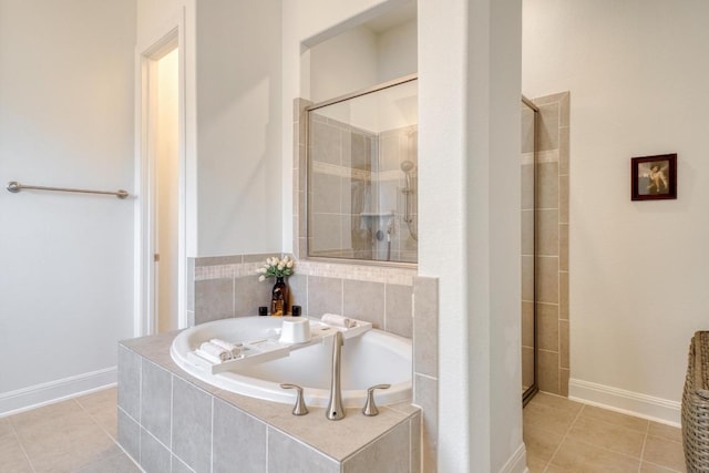 3204 Venezia Vw, Leander, TX 78641 - full bath featuring a garden tub, tiled shower, and tile patterned flooring