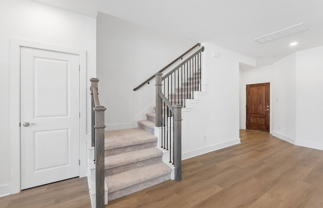 1955 Settlers Glen Dr Unit 5402, Round Rock, TX 78665 - stairway with wood finished floors, baseboards, and recessed lighting