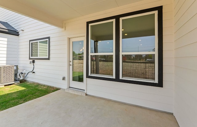 1955 Settlers Glen Dr Unit 5402, Round Rock, TX 78665 - doorway to property with central air condition unit and a patio area