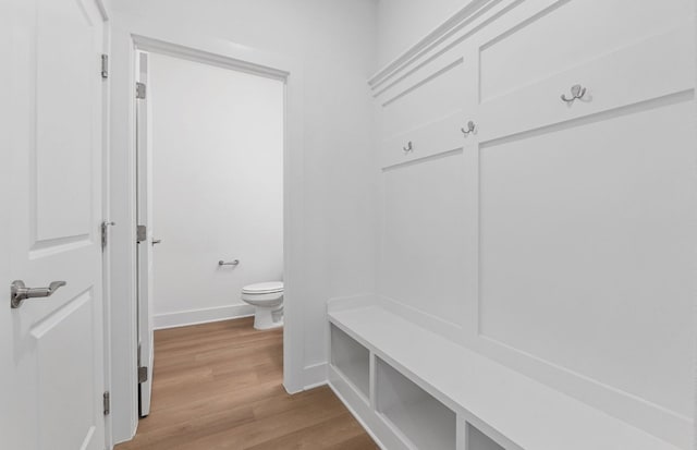 1955 Settlers Glen Dr Unit 5402, Round Rock, TX 78665 - mudroom featuring baseboards and light wood-style floors