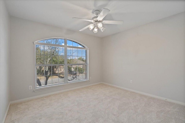 5201 Keene Cv, Austin, TX 78730 - carpeted empty room with baseboards and ceiling fan