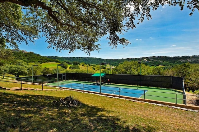 5201 Keene Cv, Austin, TX 78730 - view of tennis court with a view of trees