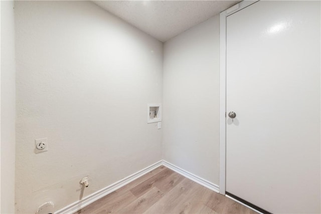 3901 Skipton Dr, Austin, TX 78727 - laundry room with light wood-type flooring, hookup for a washing machine, hookup for an electric dryer, and hookup for a gas dryer