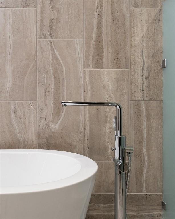 44 E Ave Unit 3203, Austin, TX 78701 - bathroom with a freestanding bath