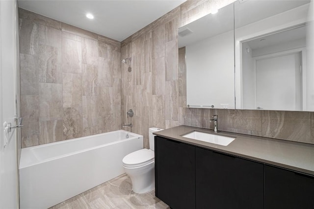 44 E Ave Unit 3203, Austin, TX 78701 - bathroom featuring tile walls, toilet, vanity, shower / bath combination, and tasteful backsplash