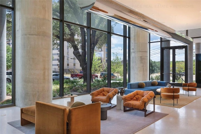 44 E Ave Unit 3203, Austin, TX 78701 - lobby with floor to ceiling windows and a towering ceiling
