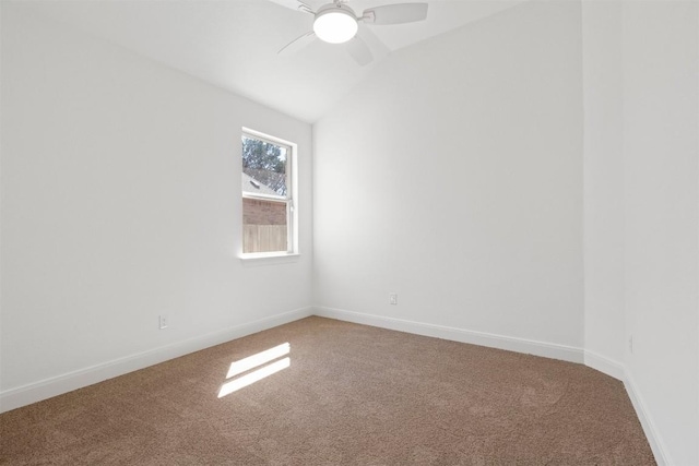 129 Du Bois Ln, Kyle, TX 78640 - unfurnished room featuring light carpet, vaulted ceiling, a ceiling fan, and baseboards