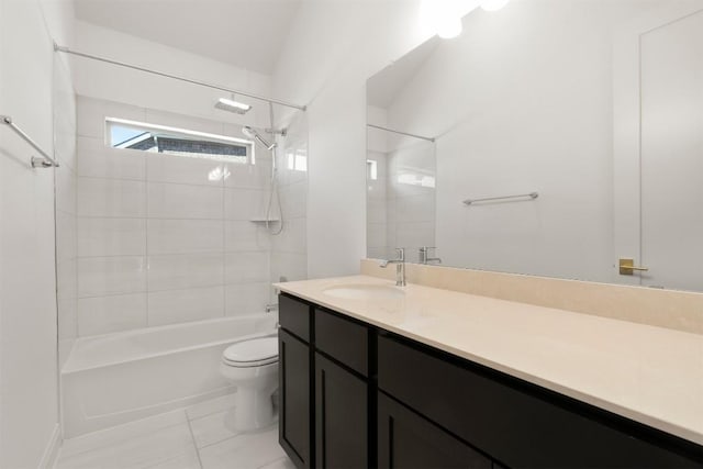 129 Du Bois Ln, Kyle, TX 78640 - bathroom with toilet, vanity, tub / shower combination, and tile patterned flooring