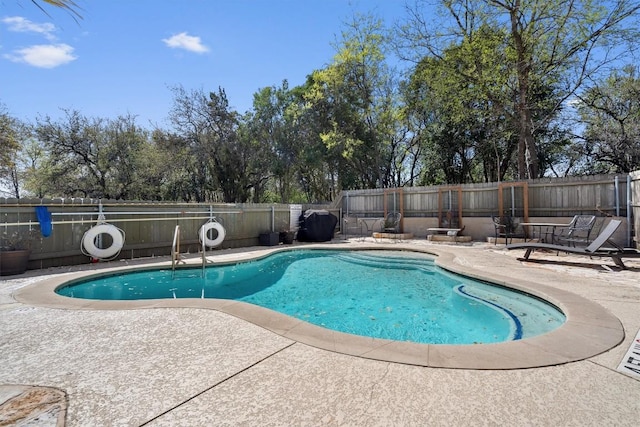 6700 Cooper Ln Unit 30, Austin, TX 78745 - view of pool featuring a patio area and a fenced backyard