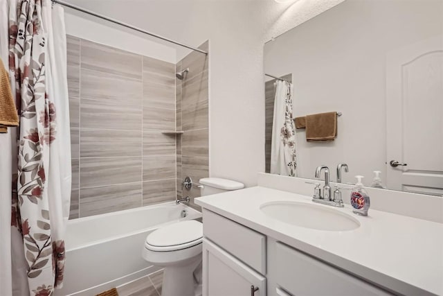 bathroom featuring shower / tub combo with curtain, vanity, and toilet