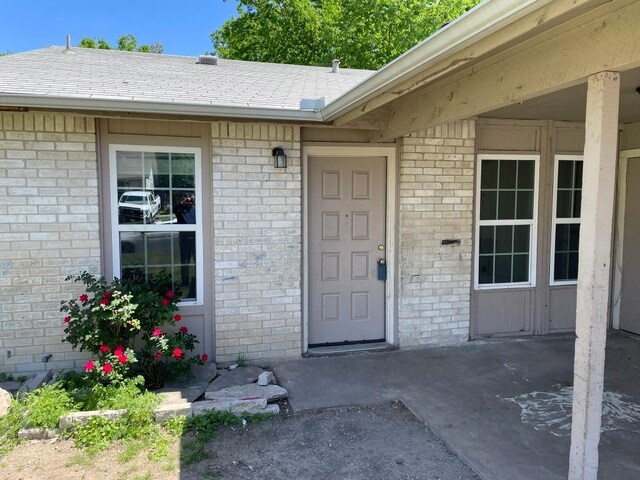 905 Fieldwood Dr, Austin, TX 78758 - view of exterior entry with brick siding