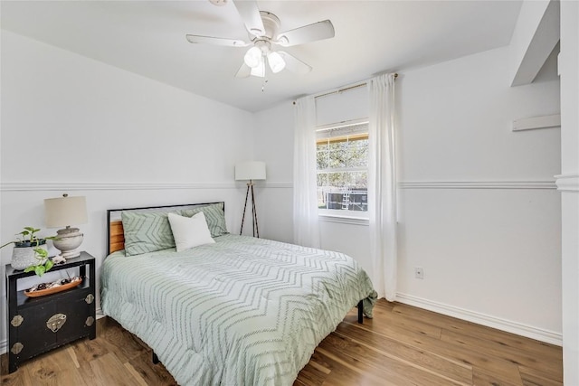 618 Bentwood Dr, Leander, TX 78641 - bedroom featuring baseboards, ceiling fan, and wood finished floors