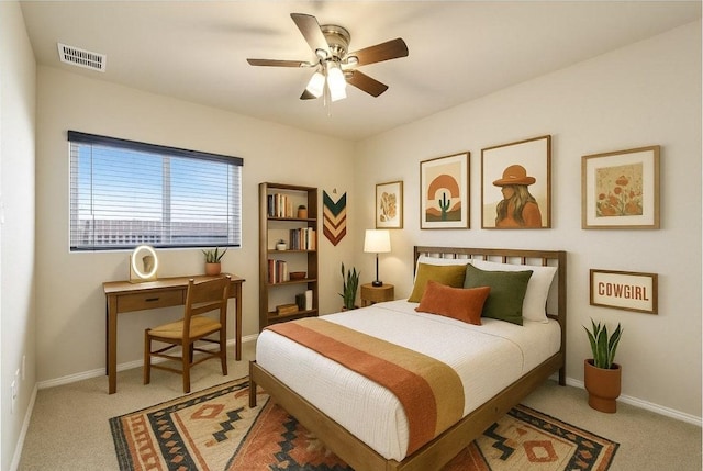 300 Wincliff Dr, Buda, TX 78610 - bedroom featuring light carpet and a ceiling fan