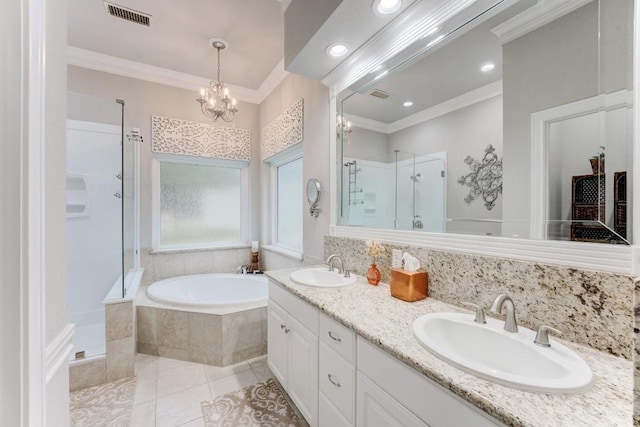 14904 Oak Shores Dr, Willis, TX 77318 - bathroom with a shower stall, crown molding, a garden tub, double vanity, and tile patterned floors