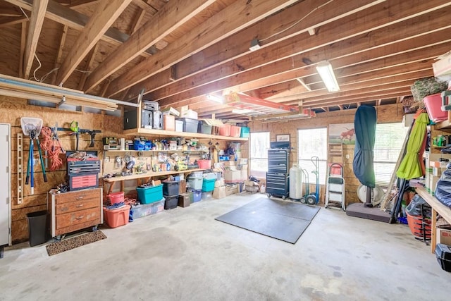 14904 Oak Shores Dr, Willis, TX 77318 - below grade area featuring a workshop area