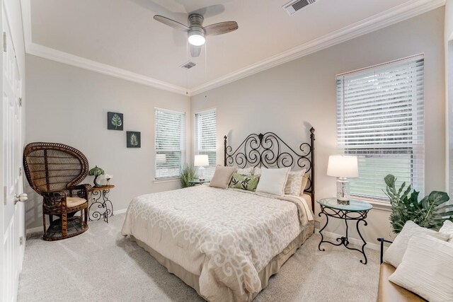 14904 Oak Shores Dr, Willis, TX 77318 - bedroom featuring light colored carpet, ornamental molding, baseboards, and a ceiling fan