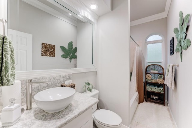 14904 Oak Shores Dr, Willis, TX 77318 - full bathroom featuring vanity, ornamental molding, toilet, shower / bath combination with curtain, and tile patterned floors