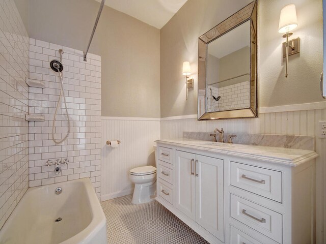1203 W 22 1/2 St, Austin, TX 78705 - bathroom with toilet, a wainscoted wall, a sink, a shower with shower door, and ornamental molding