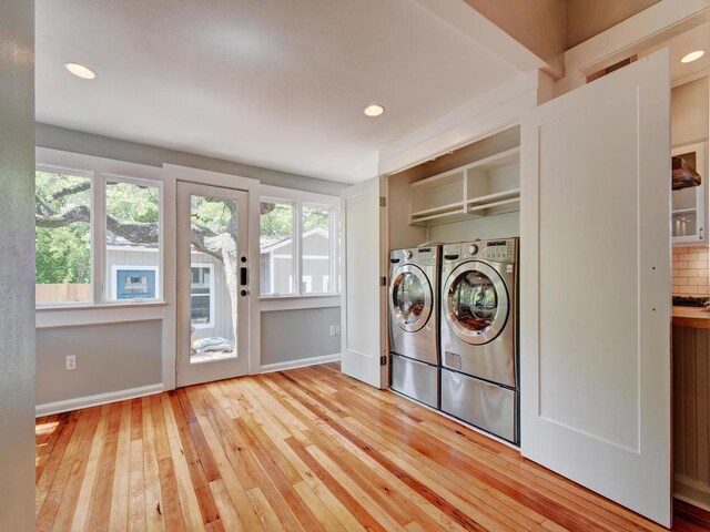 1203 W 22 1/2 St, Austin, TX 78705 - clothes washing area with washing machine and dryer, hardwood / wood-style floors, recessed lighting, and baseboards