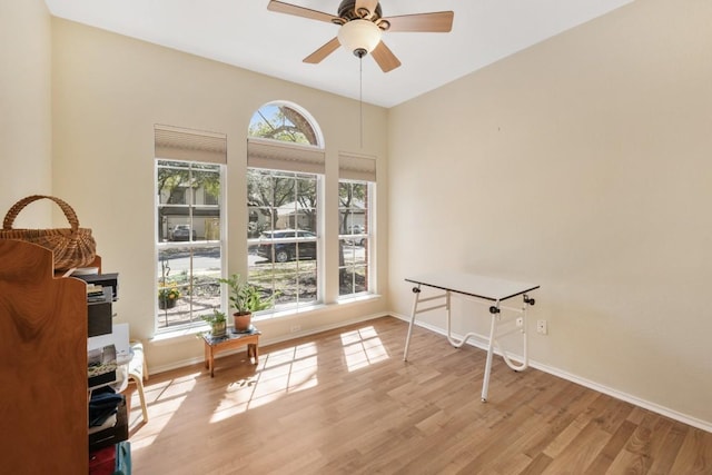 9408 Notches Dr, Austin, TX 78748 - interior space with a ceiling fan, wood finished floors, and baseboards