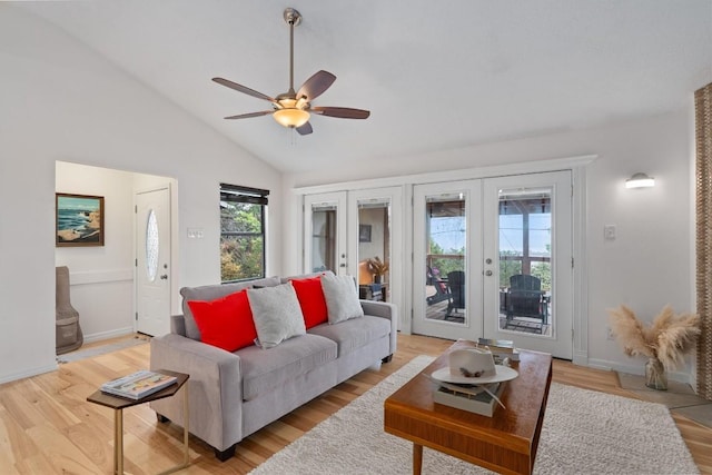4004 Highland Dr, Austin, TX 78734 - living room with french doors, baseboards, ceiling fan, vaulted ceiling, and light wood-type flooring