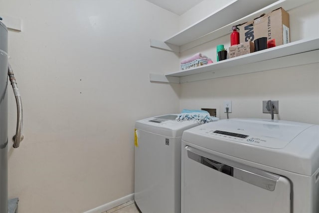 4004 Highland Dr, Austin, TX 78734 - laundry room with separate washer and dryer and baseboards