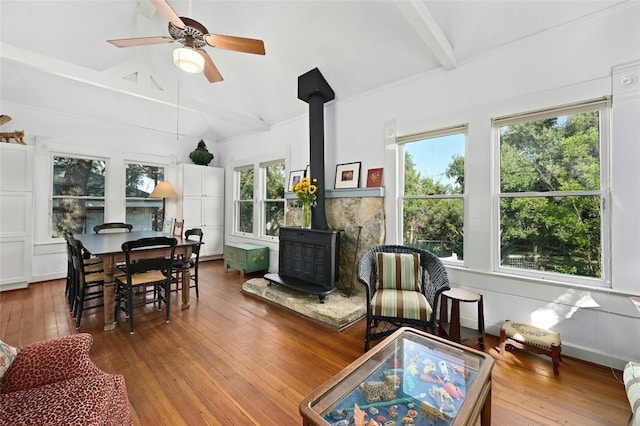 167 N Tumbleweed Trl, Austin, TX 78733 - sunroom with beamed ceiling and a wood stove