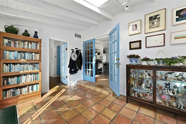 167 N Tumbleweed Trl, Austin, TX 78733 - corridor featuring tile patterned floors, visible vents, beamed ceiling, french doors, and wooden ceiling