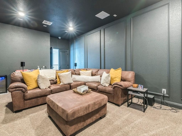 110 Pigeon River Rd, Kyle, TX 78640 - carpeted home theater room with a decorative wall, recessed lighting, a textured wall, and baseboards