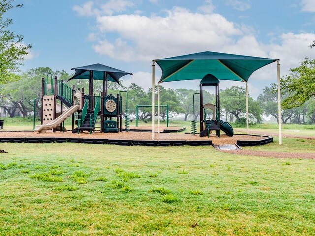 110 Pigeon River Rd, Kyle, TX 78640 - community play area featuring a yard