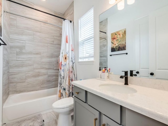 110 Pigeon River Rd, Kyle, TX 78640 - full bathroom with vanity, toilet, and shower / bathtub combination with curtain