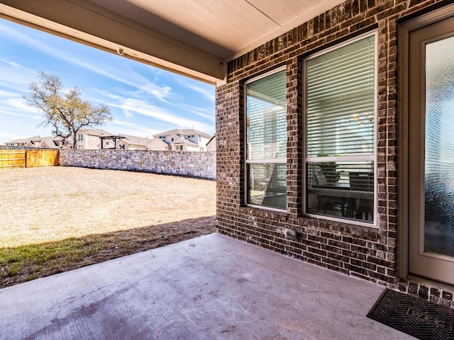 110 Pigeon River Rd, Kyle, TX 78640 - fenced backyard with a patio area